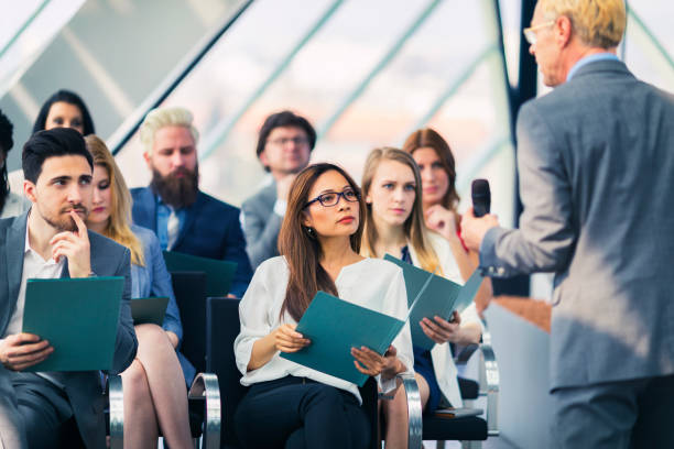 istock Group of business people attending a presentation 666066246