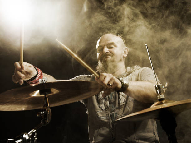 istock Silhouette of the drummer on stage. 666066682