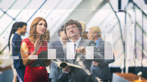 istock Business people attending a business presentation 666069536