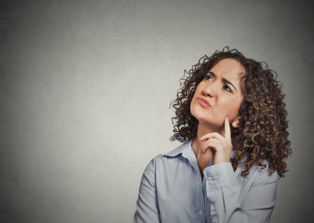 istock grumpy annoyed unhappy young woman employee 666069762