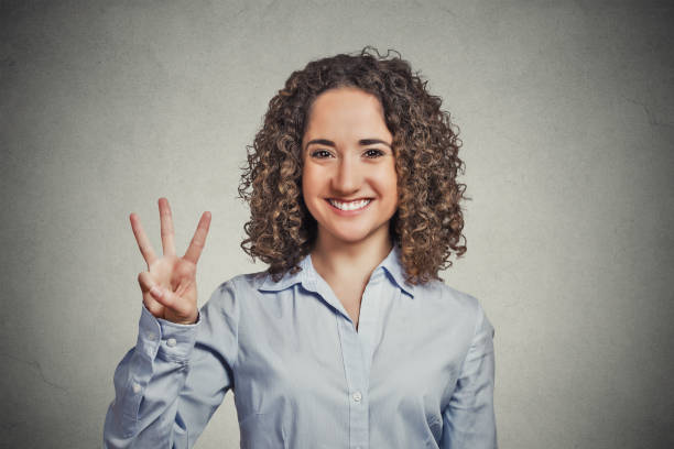 istock happy confident young smiling woman gesturing 666072330