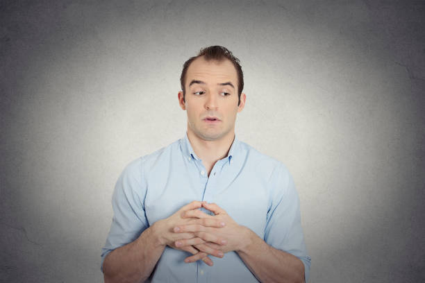 istock jealous envious, guilty, sly young business man 666073072