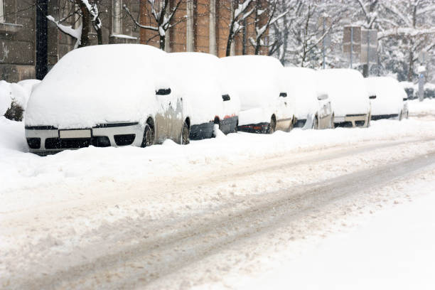 istock Parked cars covered with snow 666082086