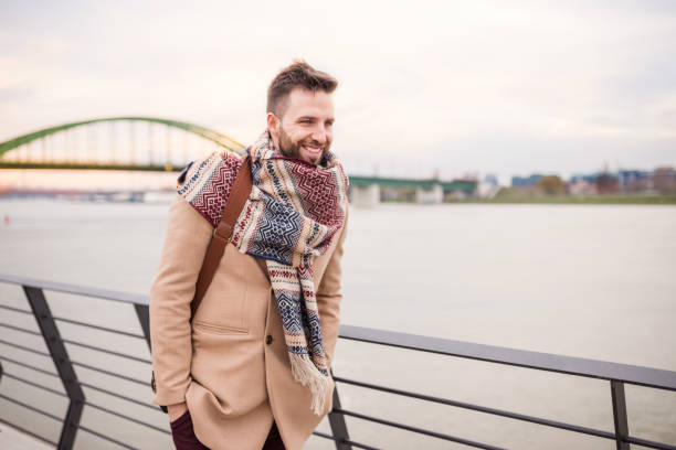 istock Handsome hipster posing with his new scarf 666082222