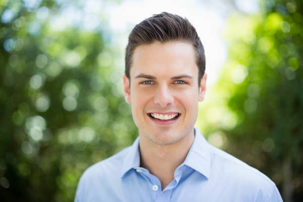 istock Portrait of man in park 666082634