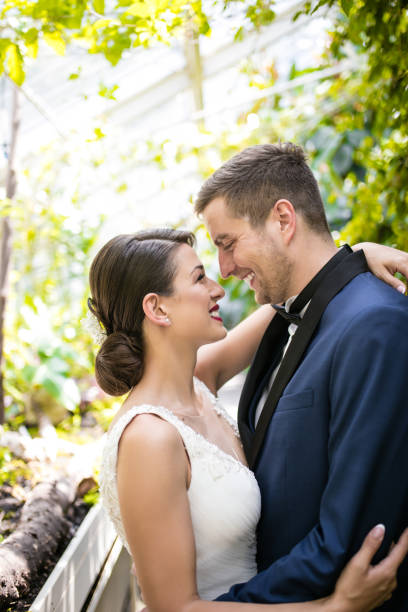 istock Bride and groom hugging each other 666088210