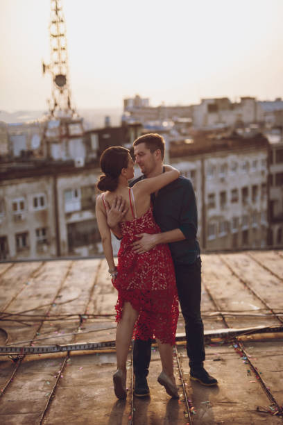 istock Tango dancers on the roof dancing in the sunset 666088434