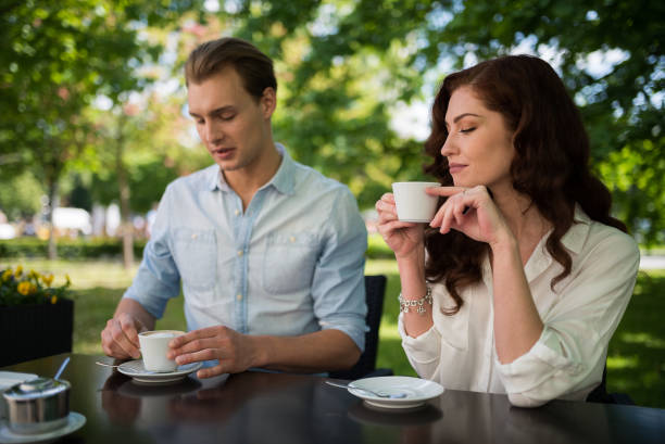 istock Young couple drinking tea together outdoor 666089124