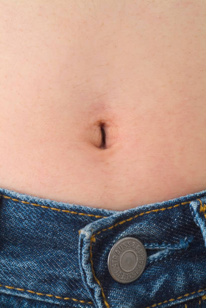 navel - belly button imagens e fotografias de stock