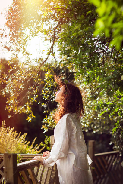 istock Young beautiful woman in sunshine 666108218
