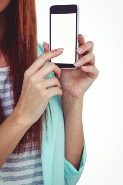 istock Smiling hipster woman showing her smartphone 666108708