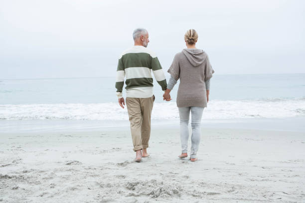 istock Cute couple walking together 666111210
