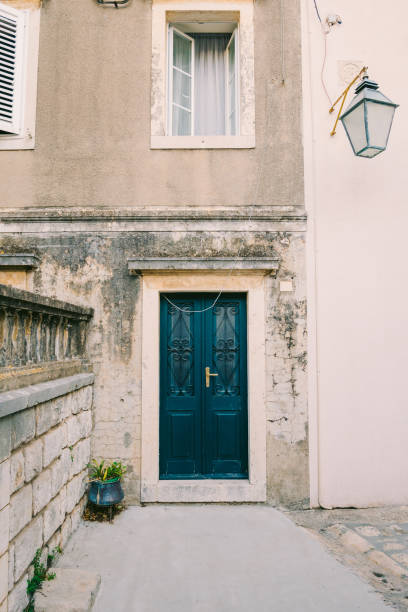 istock Old blue doors. Wood texture. Texture of metal 666129776