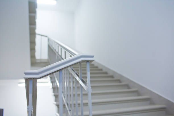 istock Interior of business center office building made with doors white ladders marble elevators elevators loft and hall 666132390