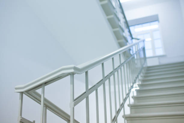 istock Interior of business center office building made with doors white ladders marble elevators elevators loft and hall 666132394