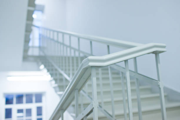istock Interior of business center office building made with doors white ladders marble elevators elevators loft and hall 666132396