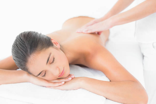 istock Pretty brunette enjoying a massage 666147020