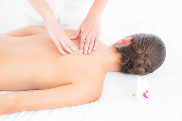 istock Pretty brunette enjoying a massage 666149378