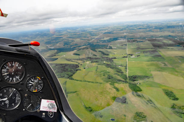 istock Glider cockpit view- instrument panel and farm land 666152934