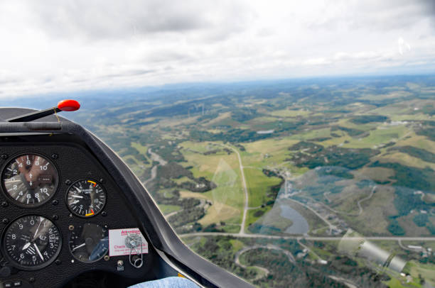 istock Glider cockpit view- instrument panel and farm land 666153000