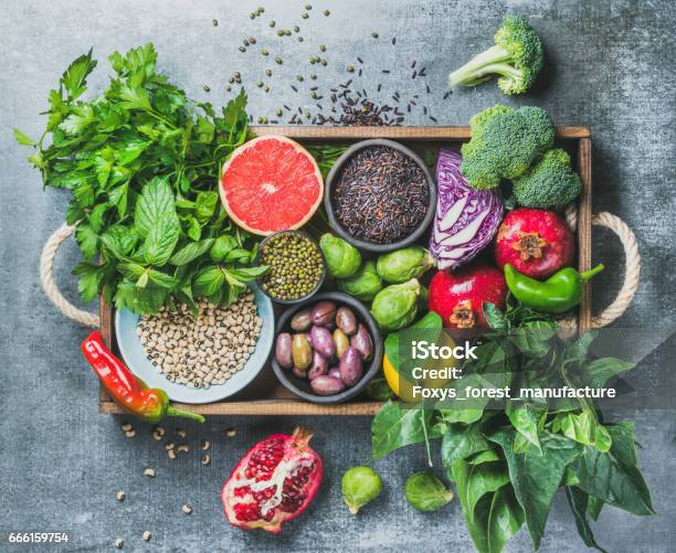 Healthy Food Ingredients In Wooden Box Over Grey Background Stock Photo - Download Image Now