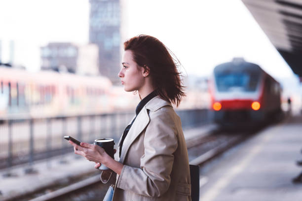 istock Sad girl waiting on the train station 666175294