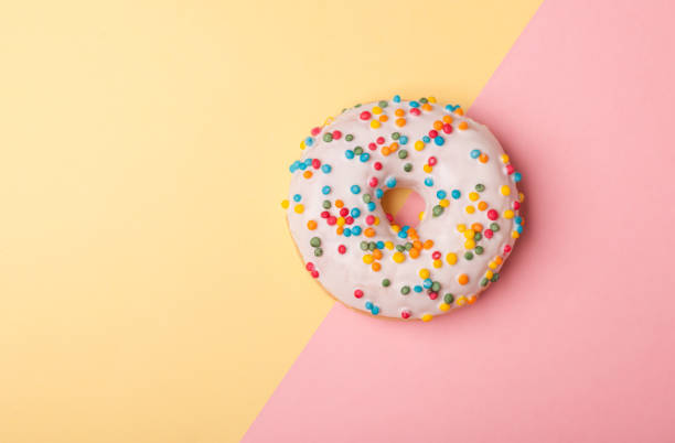 istock tasty donut isolated on bright background 666181530