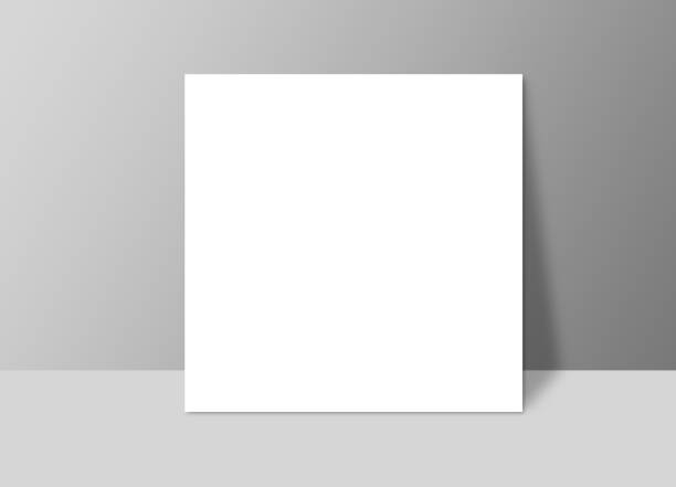 istock White blank stationary near the grey wall with shadow. Close up magazine, book, brochure, flyer, a4 letterhead, folder, leaflet, booklet 666186952