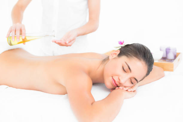 istock Beautiful brunette enjoying an oil massage 666205604