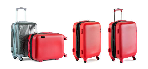 Red and silver travel luggage stock photo