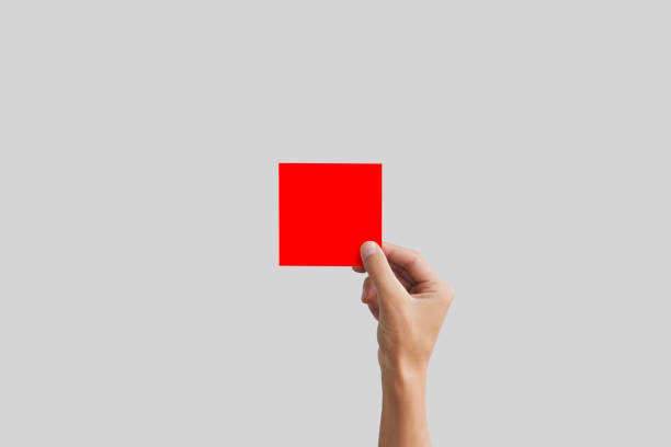 istock Right hand holding red square paper in the right hand. Leaflet presentation 666213924