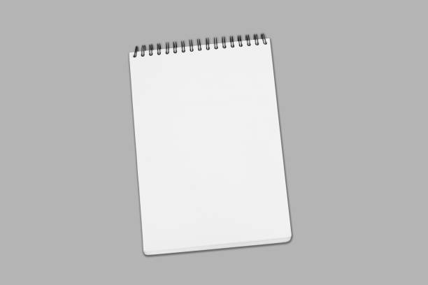 istock Blank white spiral bound paper drawing pad with shadow isolated on grey background 666216482
