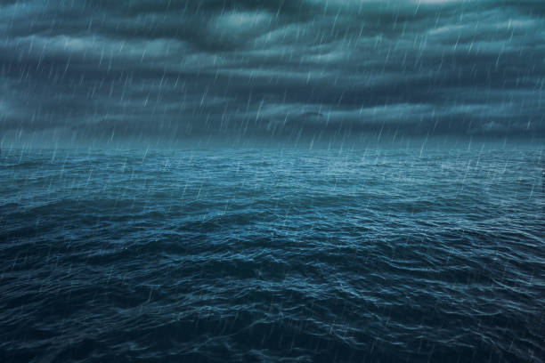 istock Rain over the stormy sea, abstract dark background. 666229206
