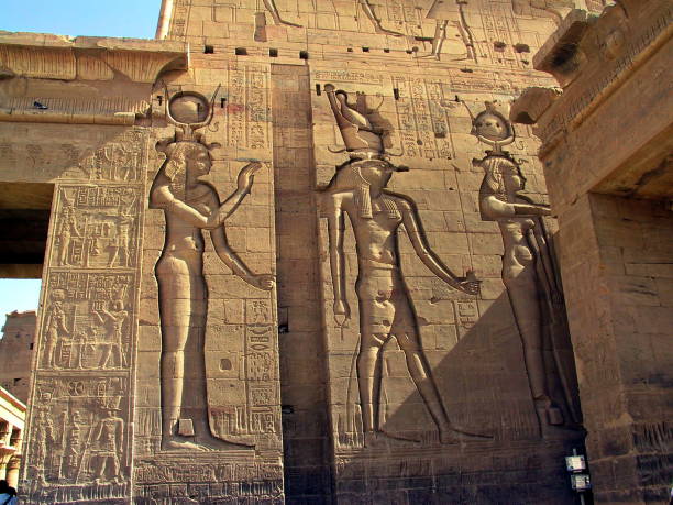 Egypt Aswan. Hathor and Horus at  Isis Temple on the Island of Philae. Aswan, Egypt.  Relief at Isis Temple. The left Lady seems to be  

 temple of philae stock pictures, royalty-free photos & images