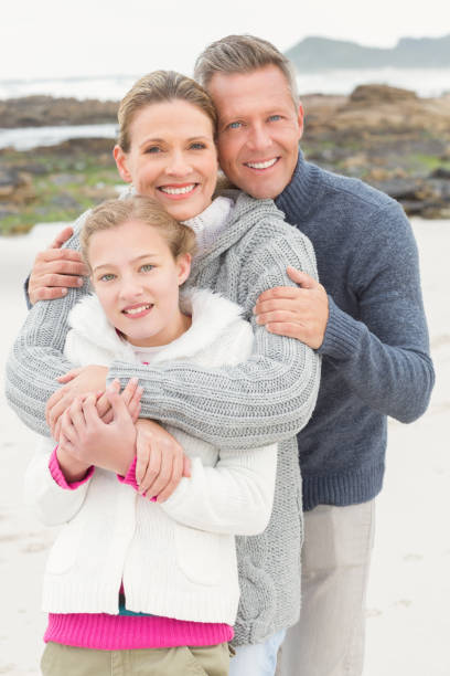 istock Mother and father with their daughter 666234978