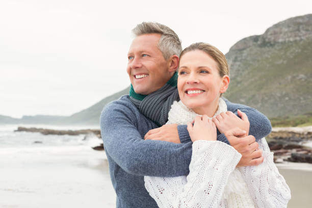 istock Cute couple standing and holding each other 666236412