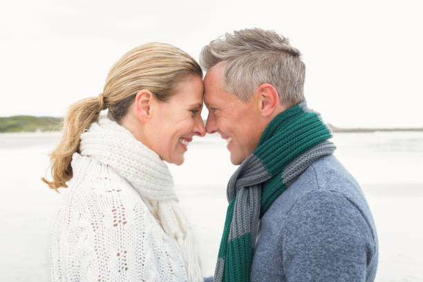 istock Cute couple standing and holding each other 666238520