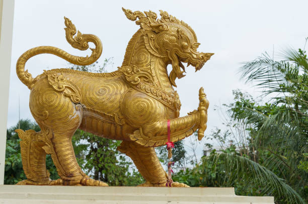 istock Gold Singha statue or lion statue 666238534