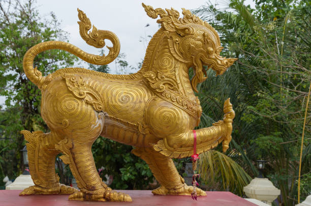 istock Gold Singha statue or lion statue 666238620