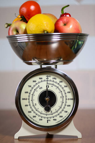 istock Retro scale with fruits and vegetables 666242322