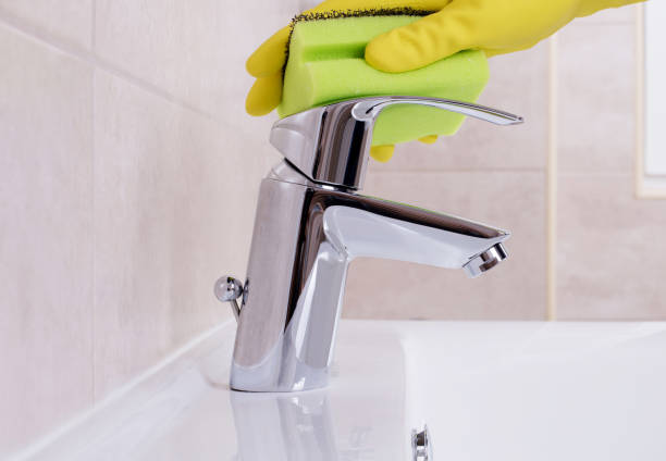 istock Cleaning the water tap 666249284