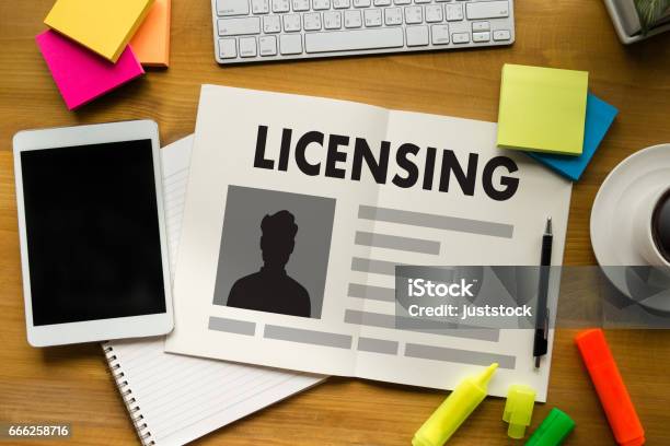 Patent License Agreement Licensing Business Man Hand Working On Laptop Computer Stock Photo - Download Image Now