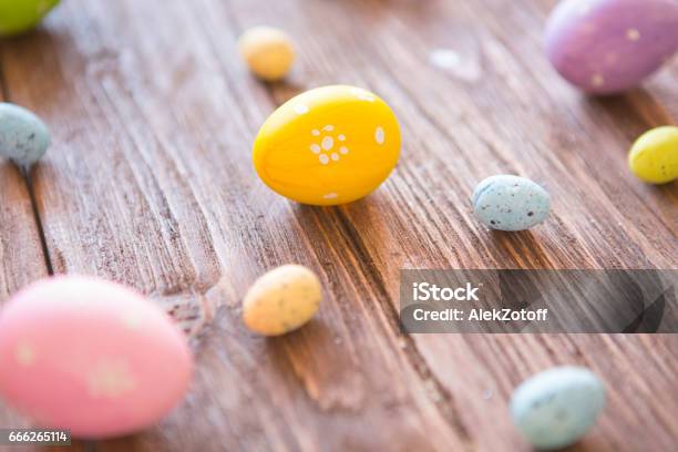 Easter Eggs Painted In Pastel Colors On Wooden Background Perspective Effect Stock Photo - Download Image Now