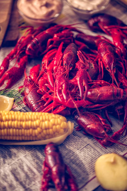 istock Boiled Red Crayfish with Sweet Corn and Potatoes 666265312
