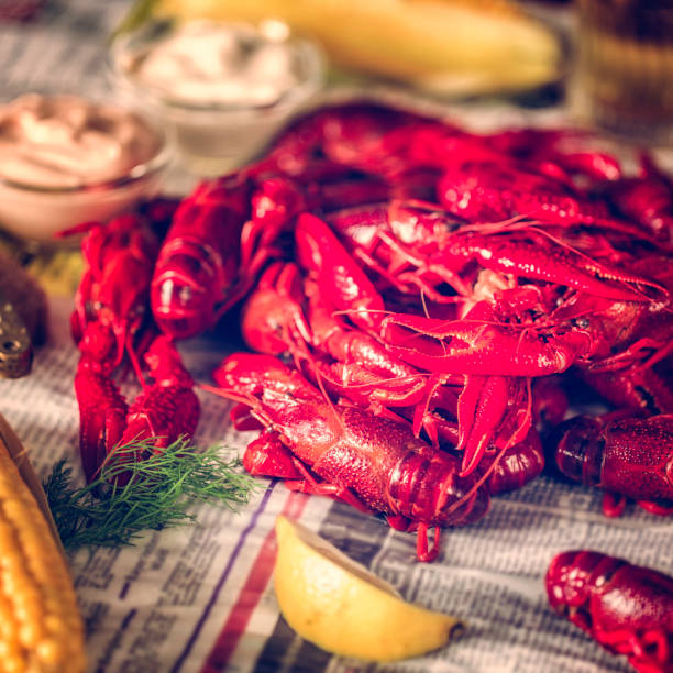 istock Boiled Red Crayfish with Sweet Corn and Potatoes 666265596