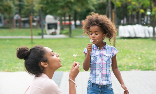 istock Mother and daughter enjoying nature 666269420