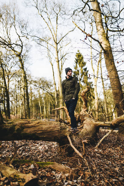 istock man hiking in the forest 666272530