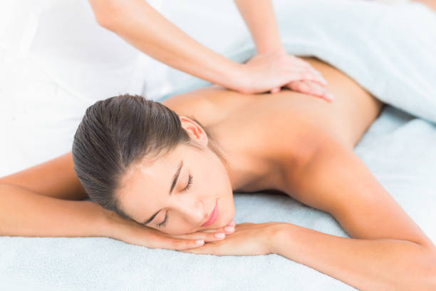 istock Beautiful brunette enjoying a massage 666279372