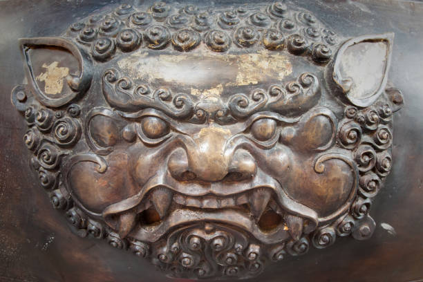 istock Brass lion head sculpture in thai temple 666283944
