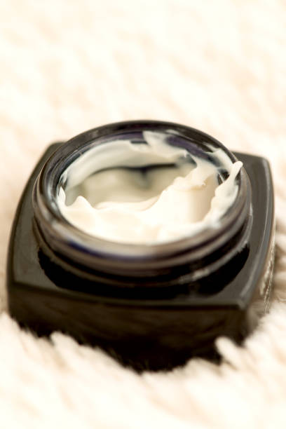 istock Cosmetic cream in jar close up shallow DOF 666293998